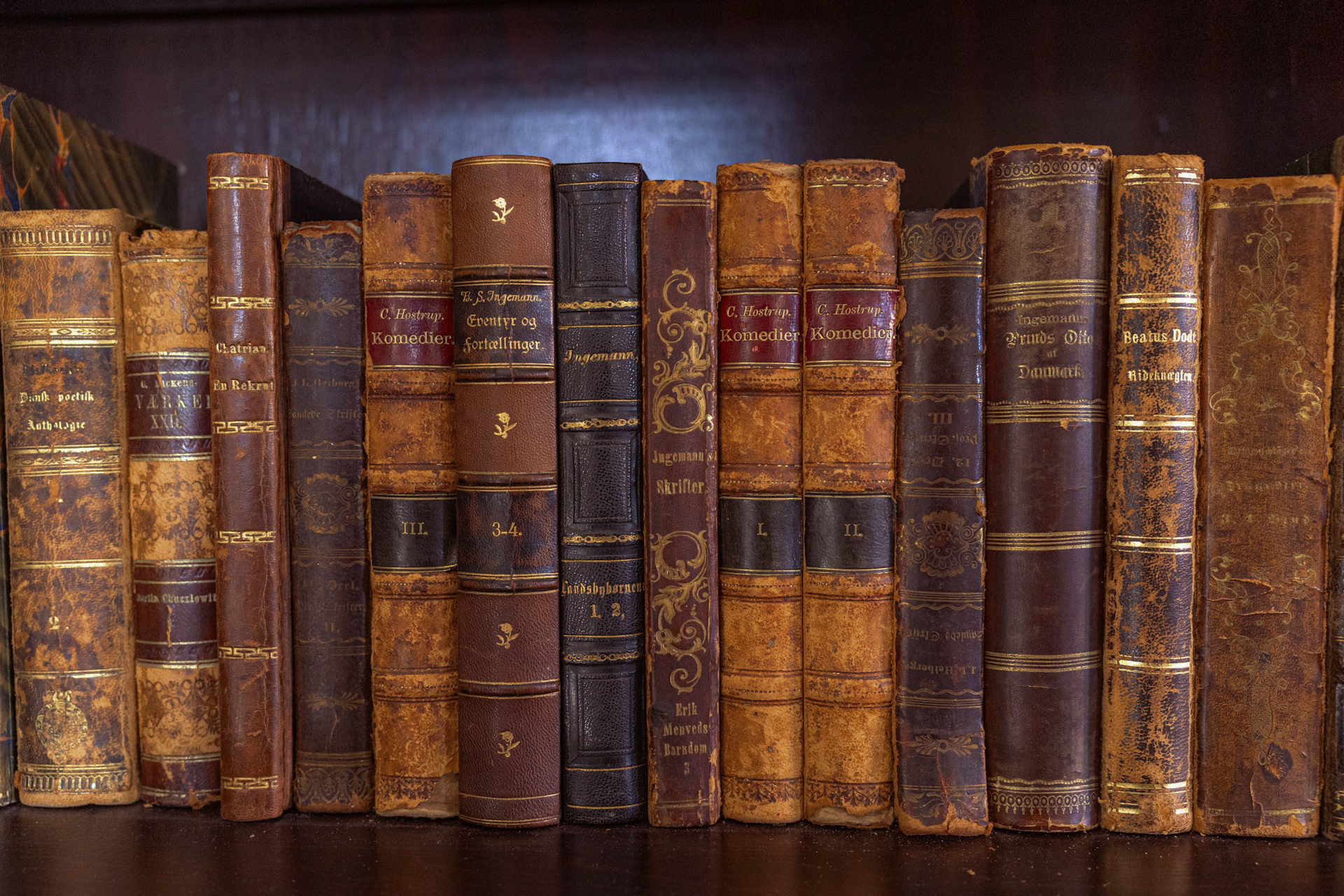 Stack of trading books on psychology and technical analysis